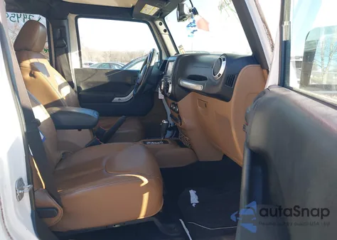 2013 Jeep Wrangler Unlimited Sahara z USA, uszkodzony, nr VIN 1C4BJWEG3DL658530